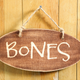 Image for article titled Mom’s Latest Halloween Decoration Just Rustic Wooden Sign That Says ‘Bones’